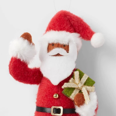 Fabric Santa Holding Gift Christmas Tree Ornament - Wondershop™: Indoor Decoration, 5.75" Holiday Theme 4 Fabric Santa Holding Gift Christmas Tree Ornament - Wondershop™: Indoor Decoration, 5.75" Holiday Theme - Image 2