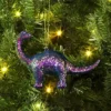 5" Christmas Plastic Chunky Glitter Dinosaur Ornament Purple - Wondershop™ 2 5" Christmas Plastic Chunky Glitter Dinosaur Ornament Purple - Wondershop™ -Wondershop Sales GUEST cc0d9af0 44b6 46fb 9ad0 1553442a740d
